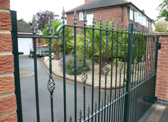 Double Gates with Ironwork Baskets